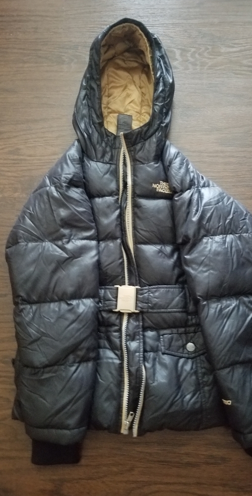 Black and gold north face coat